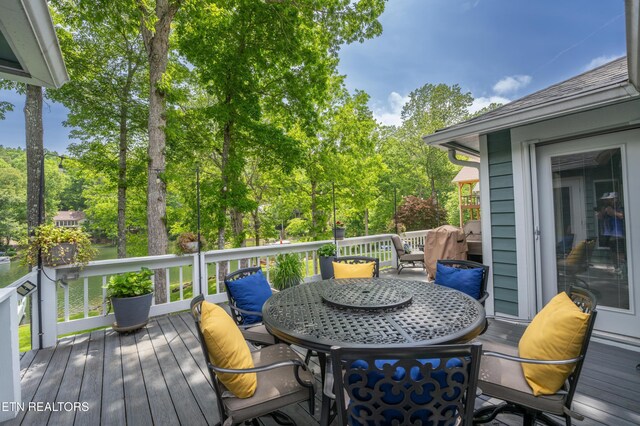 118 Motthaven Dr, Crossville, TN 38558 - wooden deck with outdoor dining space and view of scattered trees