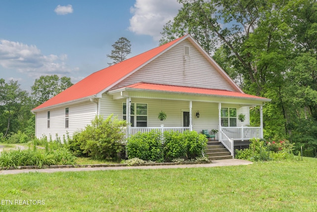 154 Boyer Rd, Andersonville, TN 37705 - view of front of property with a porch, a front lawn, and metal roof