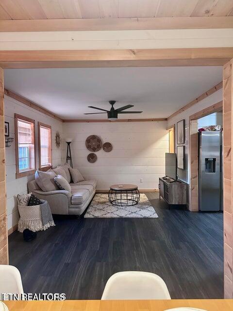 217 Yoakum Rd, Speedwell, TN 37870 - living room with a ceiling fan, wood finished floors, and baseboards