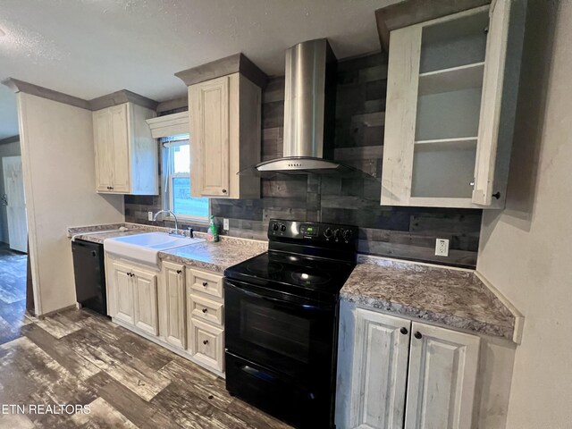 225 Orange Ln, Speedwell, TN 37870 - kitchen featuring black appliances, wall chimney range hood, a sink, dark wood-style flooring, and backsplash