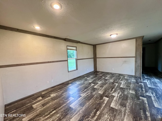 225 Orange Ln, Speedwell, TN 37870 - spare room with crown molding, wood finished floors, and a textured ceiling