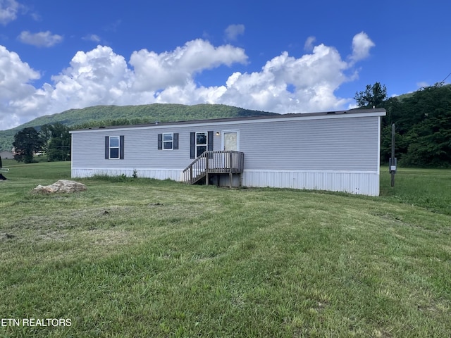 225 Orange Ln, Speedwell, TN 37870 - view of front facade featuring a mountain view and a front lawn