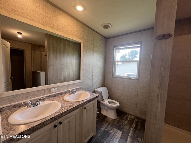 225 Orange Ln, Speedwell, TN 37870 - bathroom with wood finished floors, toilet, a shower, and double vanity