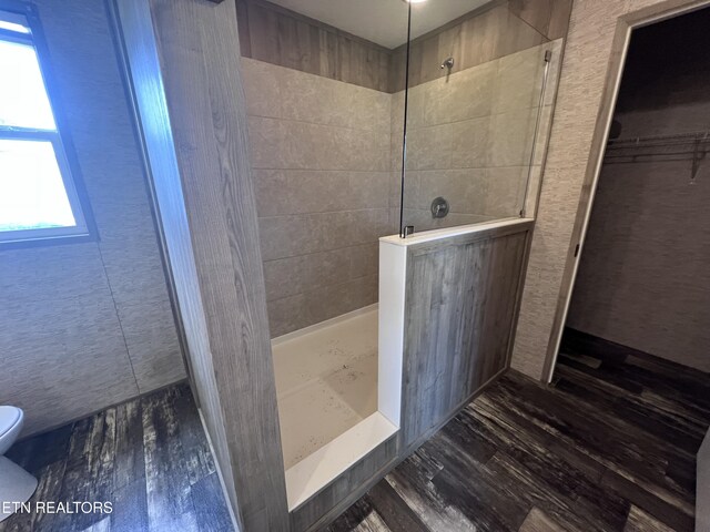 225 Orange Ln, Speedwell, TN 37870 - full bath with wood finished floors, toilet, and a walk in shower