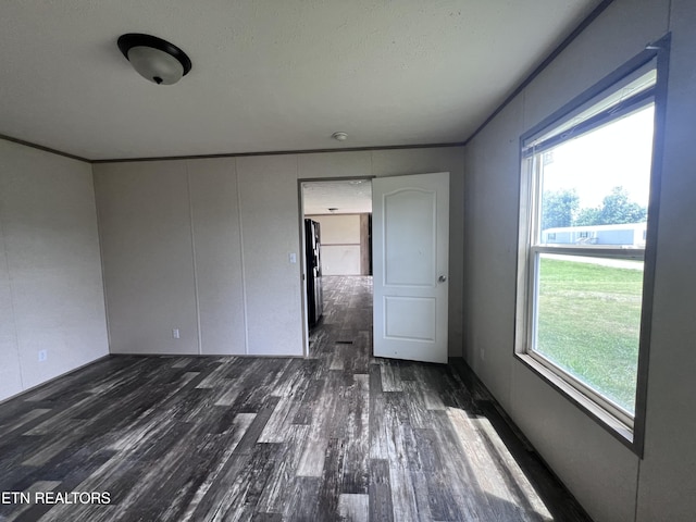 225 Orange Ln, Speedwell, TN 37870 - spare room with wood finished floors, plenty of natural light, and crown molding