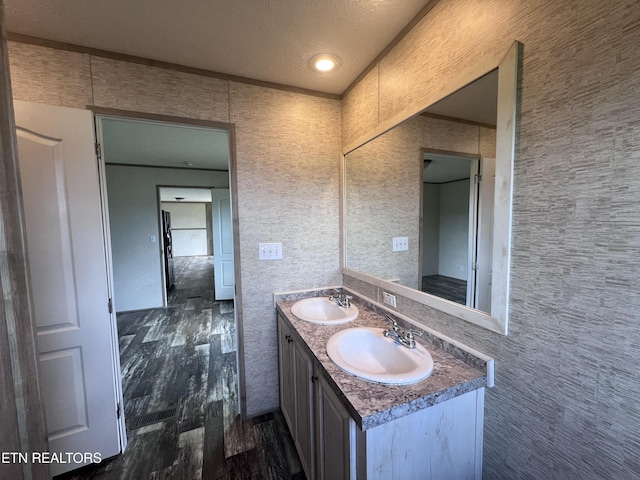 225 Orange Ln, Speedwell, TN 37870 - bathroom with wood finished floors and double vanity
