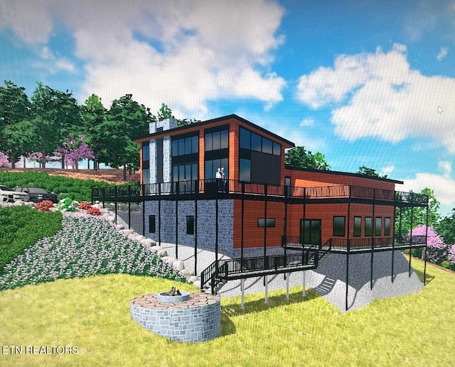 back of property with a lawn