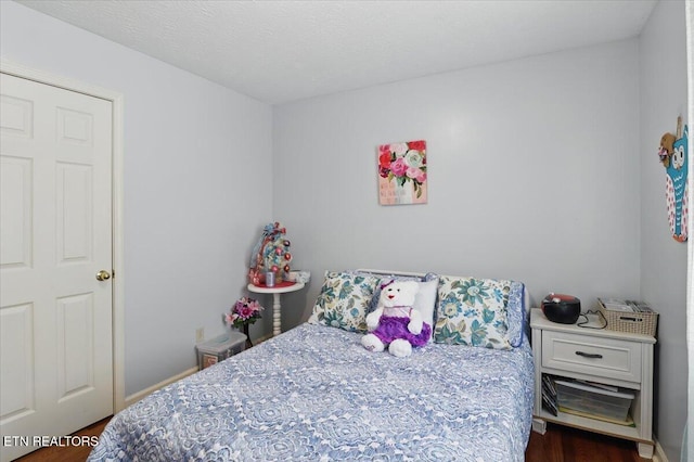 138 Robinson Ln, Middlesboro, KY 40965 - bedroom featuring dark wood-type flooring