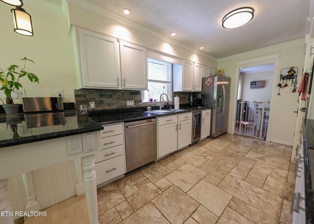 112 Chestnut Hill Rd, Oak Ridge, TN 37830 - kitchen featuring stainless steel appliances, beverage cooler, ornamental molding, decorative backsplash, and a sink