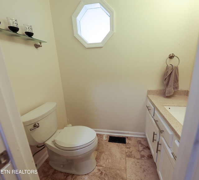 112 Chestnut Hill Rd, Oak Ridge, TN 37830 - half bathroom with toilet, vanity, and baseboards