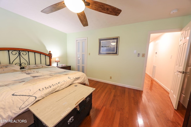 112 Chestnut Hill Rd, Oak Ridge, TN 37830 - bedroom with wood finished floors, a closet, baseboards, and ceiling fan