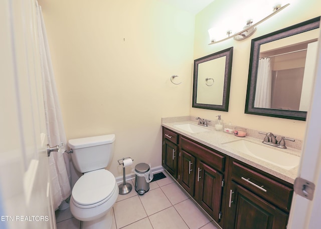 112 Chestnut Hill Rd, Oak Ridge, TN 37830 - full bathroom with toilet, tile patterned flooring, double vanity, and baseboards