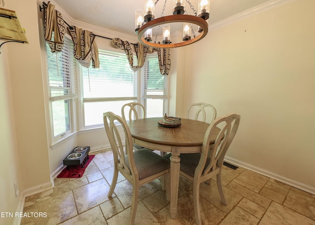 112 Chestnut Hill Rd, Oak Ridge, TN 37830 - dining space with a chandelier, baseboards, stone tile floors, and ornamental molding