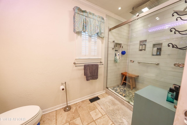112 Chestnut Hill Rd, Oak Ridge, TN 37830 - full bath featuring baseboards, a stall shower, crown molding, toilet, and stone finish floors