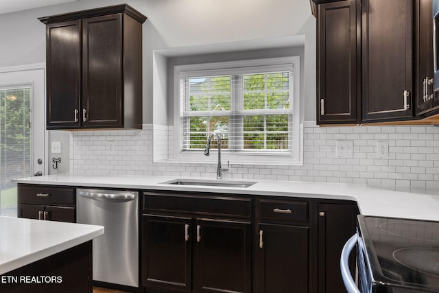 12888 Lily Pond Ln, Knoxville, TN 37922 - kitchen featuring stainless steel dishwasher, a sink, and light countertops
