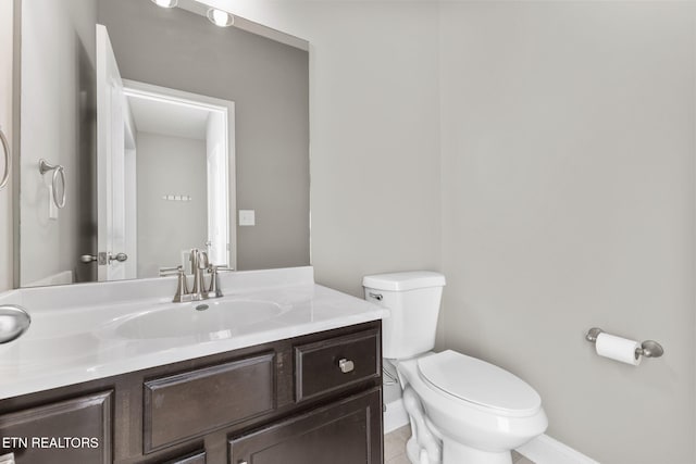 12888 Lily Pond Ln, Knoxville, TN 37922 - half bathroom featuring baseboards, toilet, vanity, and tile patterned floors