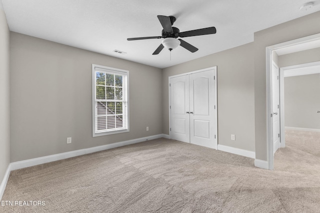 12888 Lily Pond Ln, Knoxville, TN 37922 - unfurnished bedroom featuring carpet floors, a closet, baseboards, and ceiling fan