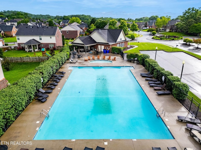 12888 Lily Pond Ln, Knoxville, TN 37922 - community pool with a residential view, a jacuzzi, fence, and a patio area