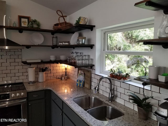 667 Turkey Nest Rd, Gatlinburg, TN 37738 - kitchen with stainless steel range with electric cooktop, a sink, open shelves, decorative backsplash, and lofted ceiling