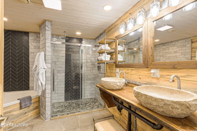 529 Deer Path Ln, Gatlinburg, TN 37738 - full bath featuring a stall shower, double vanity, recessed lighting, wood ceiling, and a bathtub