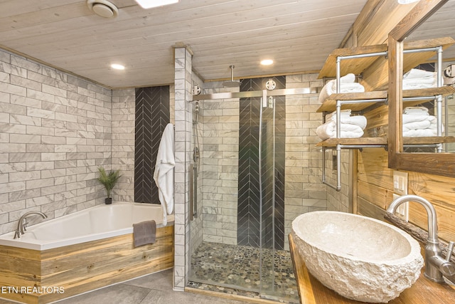 529 Deer Path Ln, Gatlinburg, TN 37738 - full bathroom with a sink, a garden tub, a shower stall, wooden ceiling, and recessed lighting