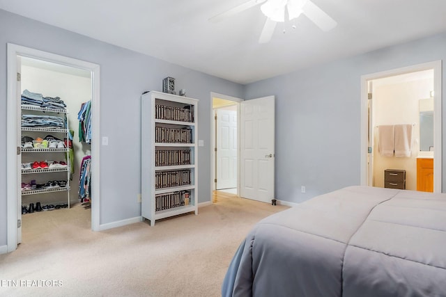 157 Garfield Ct, Crossville, TN 38558 - bedroom featuring a walk in closet, carpet, a closet, and baseboards