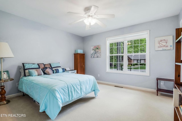 157 Garfield Ct, Crossville, TN 38558 - carpeted bedroom featuring baseboards and ceiling fan