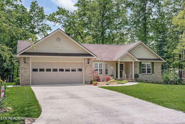 157 Garfield Ct, Crossville, TN 38558 - single story home with brick siding, driveway, an attached garage, and roof with shingles