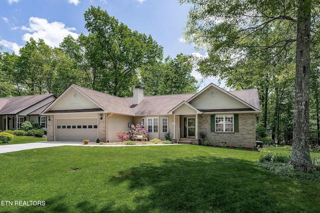 157 Garfield Ct, Crossville, TN 38558 - single story home with brick siding, a garage, a front yard, concrete driveway, and a chimney