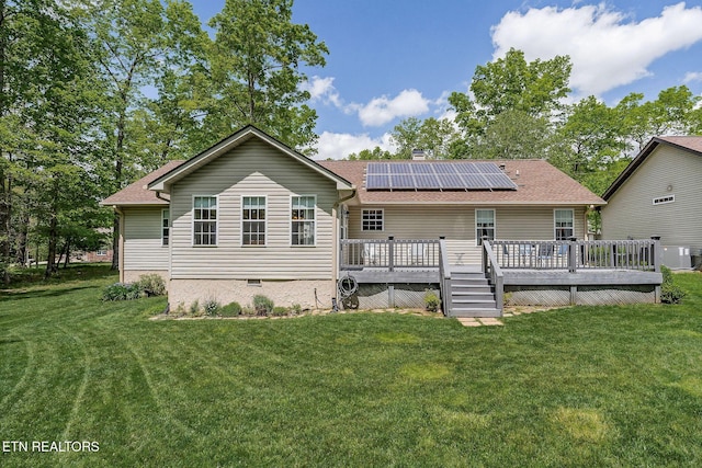157 Garfield Ct, Crossville, TN 38558 - back of property featuring a lawn, crawl space, roof mounted solar panels, a deck, and central air condition unit