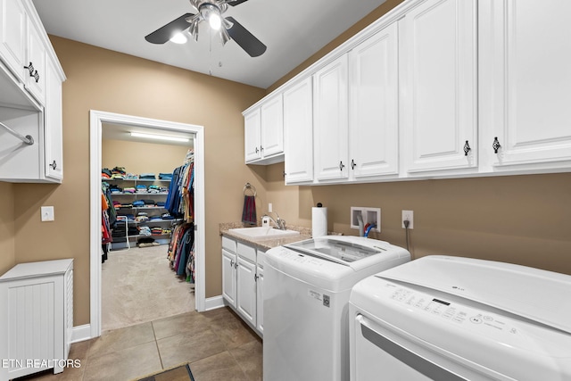 115 Tecumseh Ln, Loudon, TN 37774 - washroom with washing machine and clothes dryer, cabinet space, a ceiling fan, baseboards, and light tile patterned floors