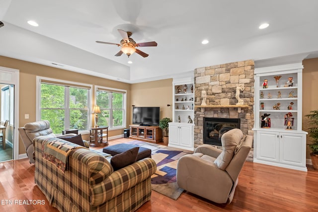 115 Tecumseh Ln, Loudon, TN 37774 - living room with a ceiling fan, wood finished floors, a fireplace, recessed lighting, and built in shelves