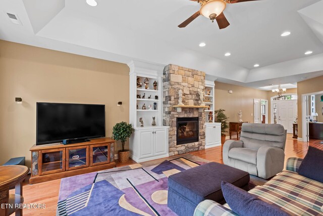115 Tecumseh Ln, Loudon, TN 37774 - living room with ceiling fan, light wood-style flooring, a fireplace, recessed lighting, and a tray ceiling