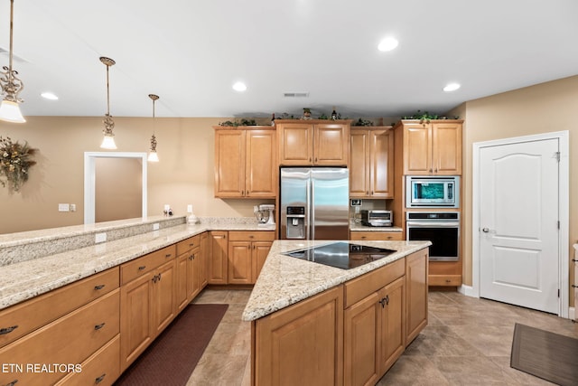 115 Tecumseh Ln, Loudon, TN 37774 - kitchen with stainless steel appliances, light stone countertops, a kitchen island, pendant lighting, and light brown cabinetry