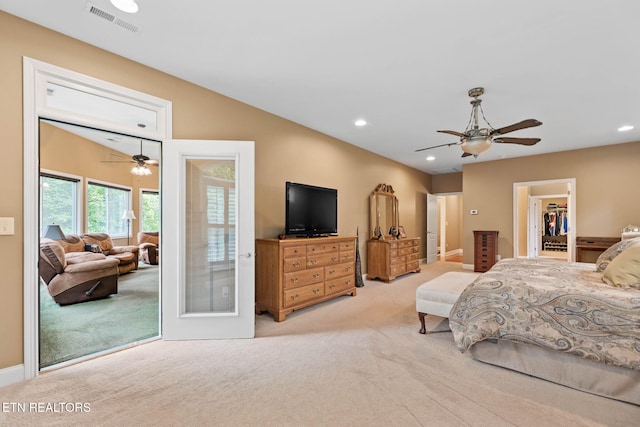 115 Tecumseh Ln, Loudon, TN 37774 - bedroom with light carpet, recessed lighting, a walk in closet, ceiling fan, and baseboards