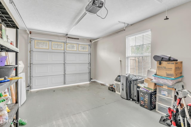 garage featuring a garage door opener
