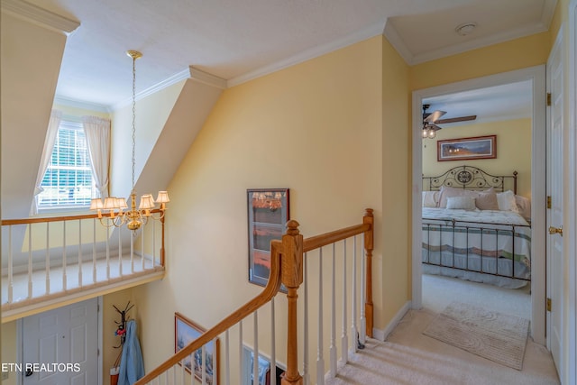 312 Cheestana Way, Loudon, TN 37774 - hallway featuring a chandelier, an upstairs landing, ornamental molding, carpet floors, and baseboards