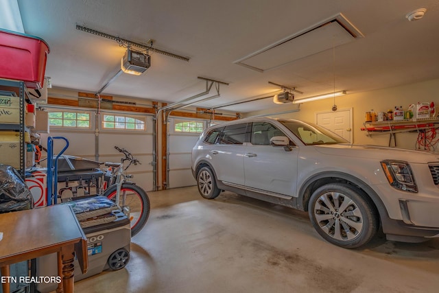 312 Cheestana Way, Loudon, TN 37774 - garage with a garage door opener