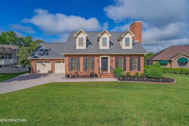 312 Cheestana Way, Loudon, TN 37774 - cape cod-style house featuring brick siding, a chimney, an attached garage, driveway, and a front yard