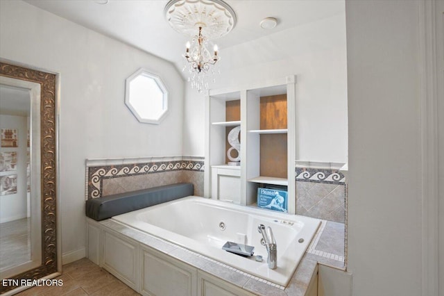 700 Shanghai Landing Ln Unit 11, Lafollette, TN 37766 - full bathroom featuring a chandelier, a tub with jets, and baseboards