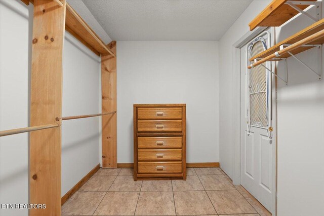 700 Shanghai Landing Ln Unit 11, Lafollette, TN 37766 - spacious closet with light tile patterned flooring