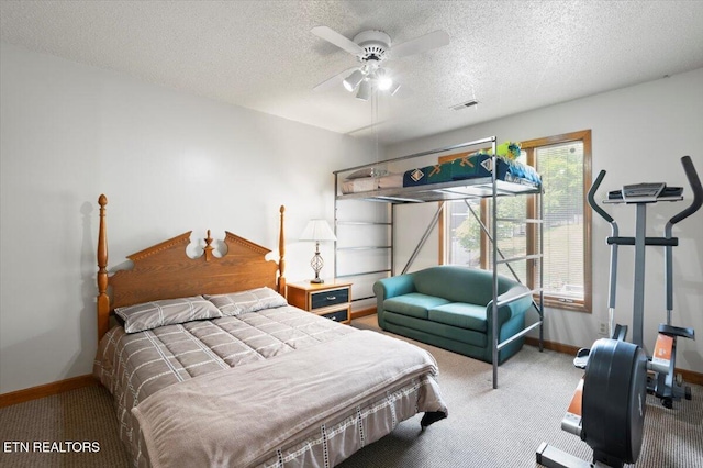 700 Shanghai Landing Ln Unit 11, Lafollette, TN 37766 - bedroom featuring carpet flooring, baseboards, a textured ceiling, and ceiling fan