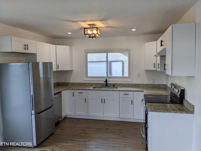 628 Algonquin Dr, Morristown, TN 37813 - kitchen featuring stainless steel appliances, a sink, dark wood finished floors, white cabinets, and recessed lighting