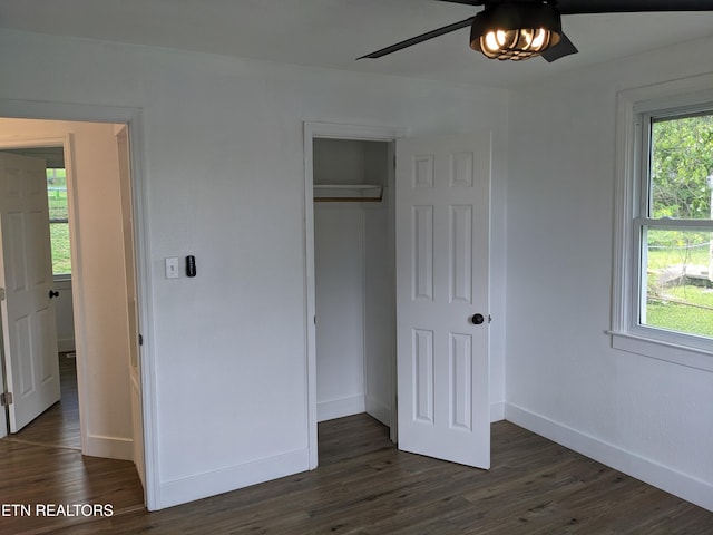 628 Algonquin Dr, Morristown, TN 37813 - unfurnished bedroom with dark wood finished floors, baseboards, a closet, and a ceiling fan
