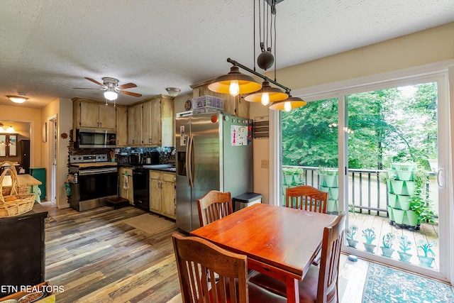 103 Renner Ln, Oliver Springs, TN 37840 - dining area with a textured ceiling, wood finished floors, and ceiling fan
