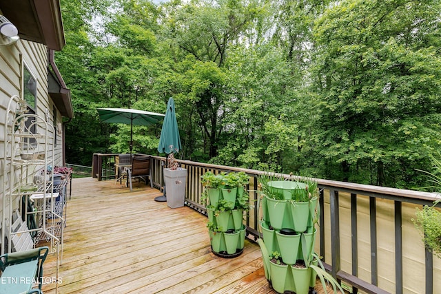 103 Renner Ln, Oliver Springs, TN 37840 - deck with outdoor dining space and view of scattered trees