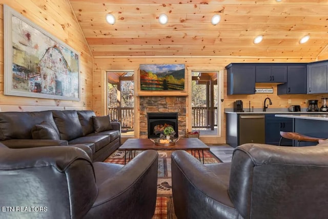 living room with wooden ceiling, wood walls, lofted ceiling, wood finished floors, and plenty of natural light