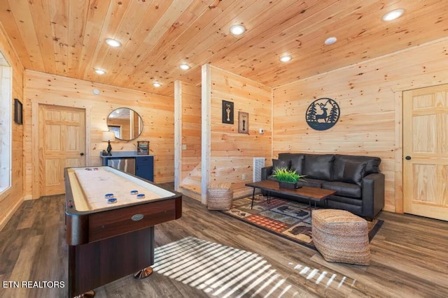 playroom with recessed lighting, wood walls, wood ceiling, and dark wood-style flooring