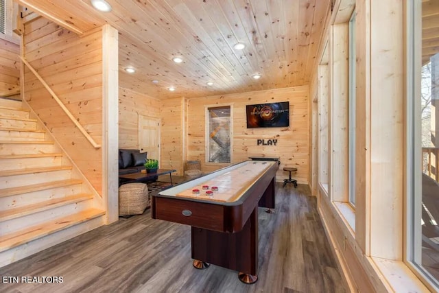 recreation room featuring recessed lighting, wood ceiling, dark wood finished floors, and wooden walls