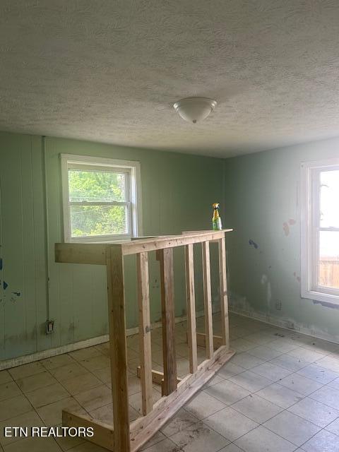 3614 Selma Ave, Knoxville, TN 37914 - unfurnished room with a textured ceiling and baseboards